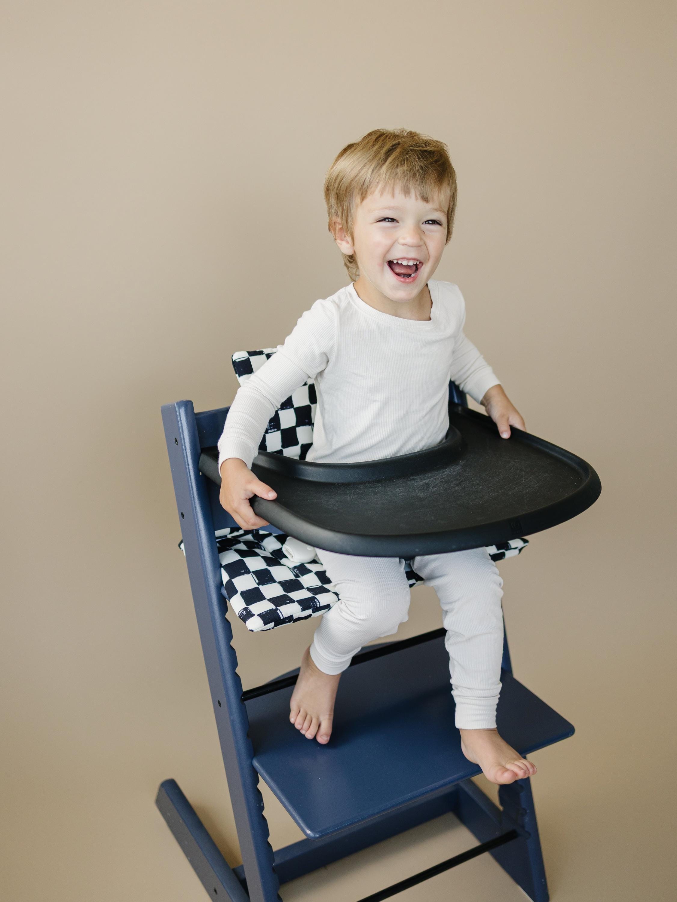Schwarz-weiß kariertes Hochstuhl-Kissen – abwischbarer Stokke Tripp Trapp Bezug
